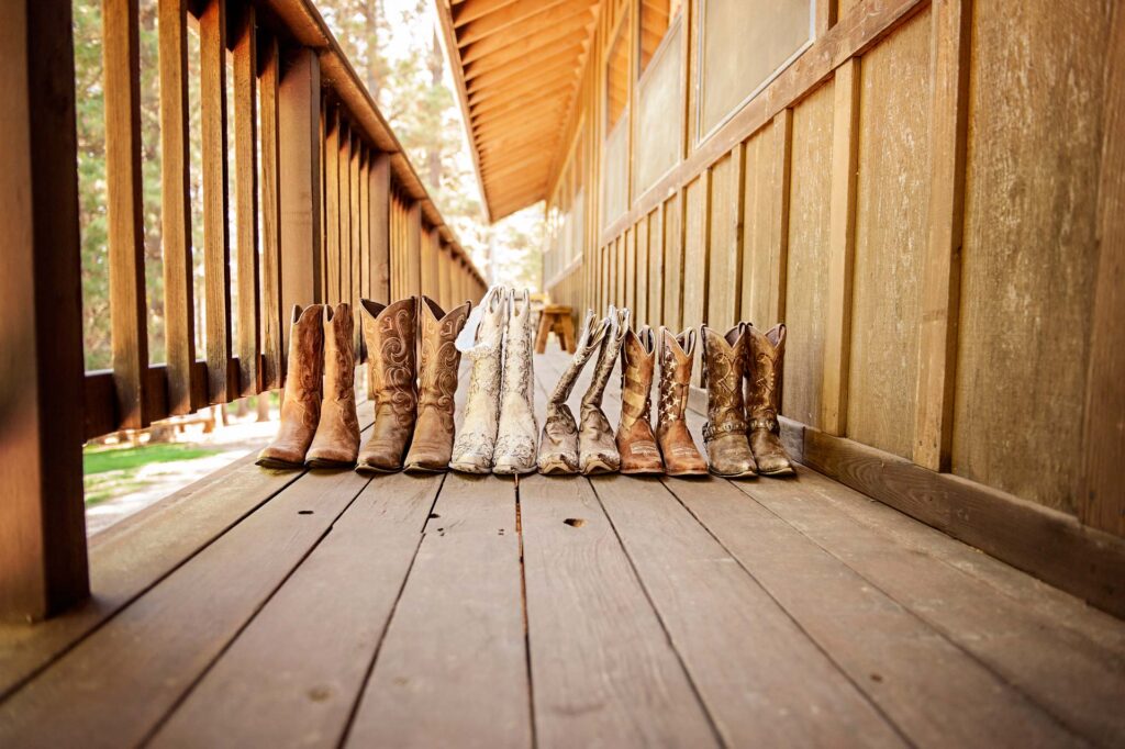 Wedding decorations of assorted boots at Apple Hill's wedding venue.
